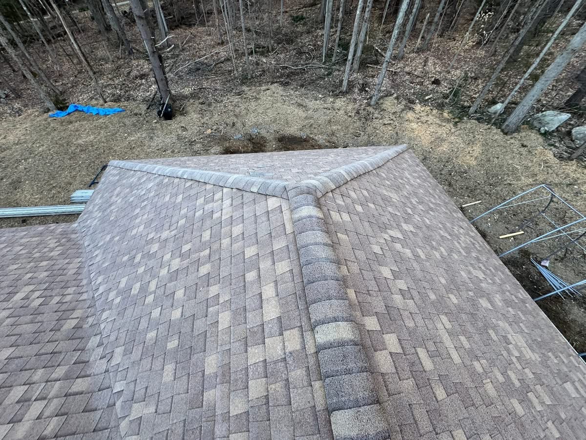 Hip roof ridge detail with new architectural shingles